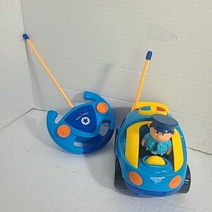 Prextex Cartoon RC Police Car Boys Toy Plays 🎶 Music Lights, Siren 🚨.